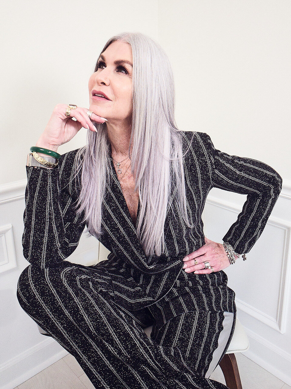 lisa in a pinstripe suit by norma komali