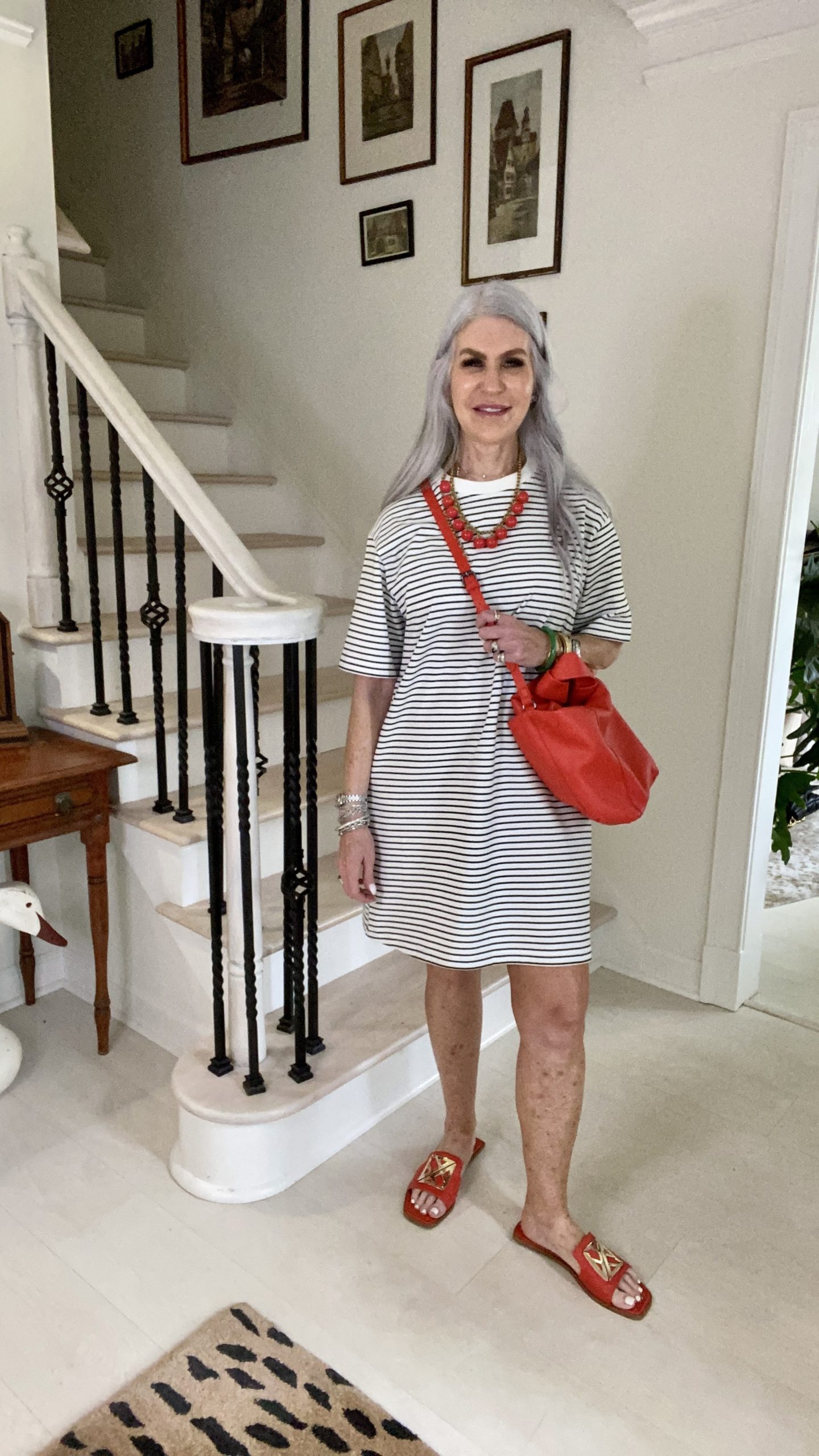 silver hair lady wearing striped t-shirt dress