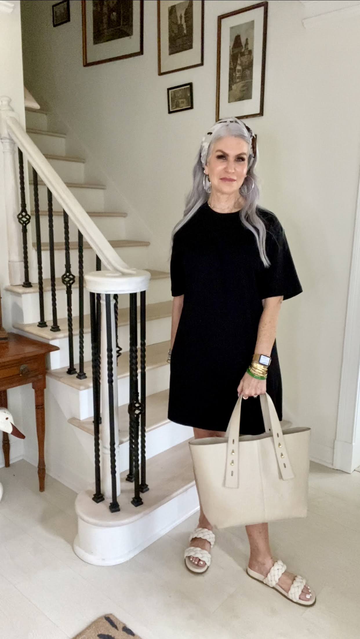 Silver hair lady styling black t-shirt dress