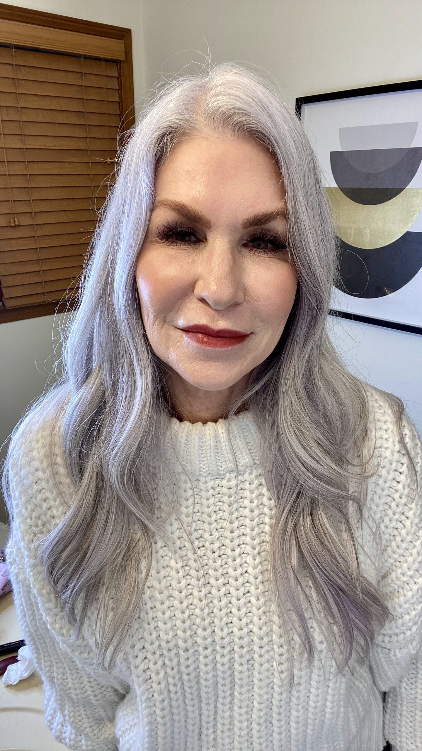 silver hair woman wearing red lipstick