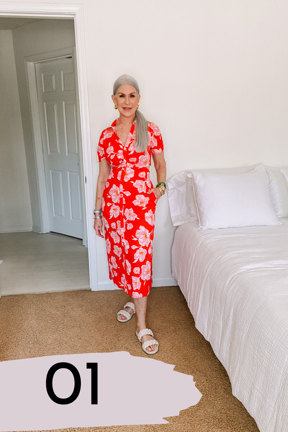 silver hair lady wearing red and white patterned dress